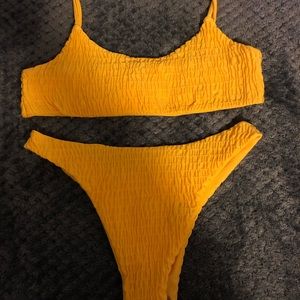 Brand new yellow bathing suit size medium